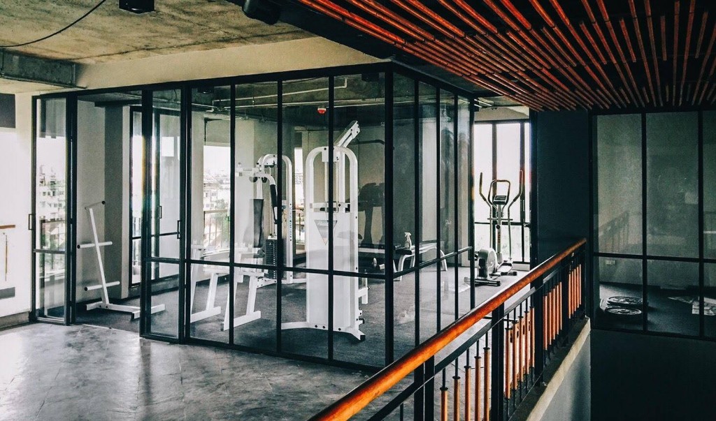 Glass-enclosed fitness center with exercise machines
