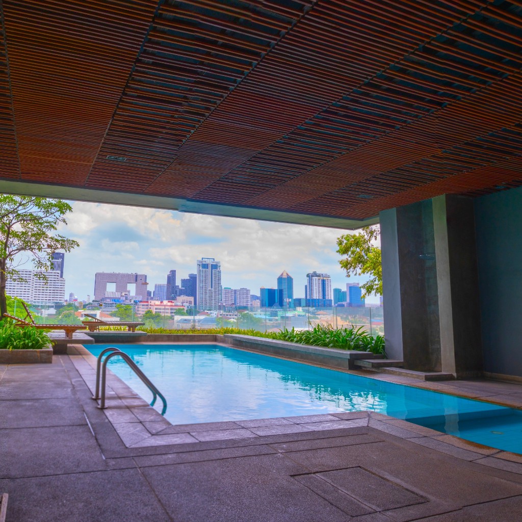 Swimming pool overlooking Bangkok city skyline